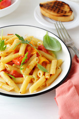 pasta penne with cheese and tomato