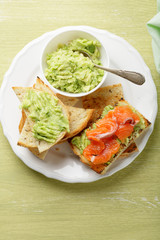 toasts with avicado cream and trout