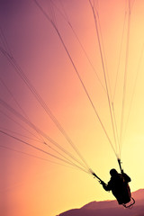 Paragliders passion is paragliding at the sky