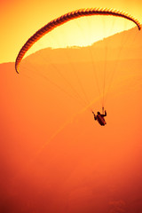 Paragliders passion is paragliding at the sky