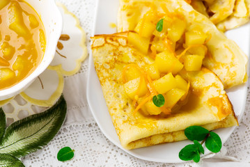  pancakes with orange  and pears sauce