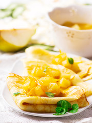  pancakes with orange  and pears sauce