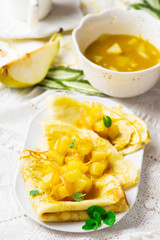  pancakes with orange  and pears sauce