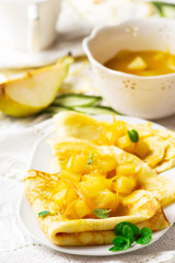 pancakes with orange  and pears sauce
