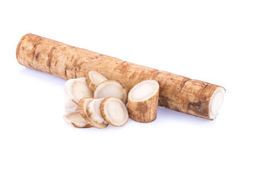 Fresh Burdock roots on white background