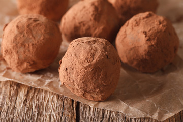 Homemade Chocolate truffles macro on a table in a rustic style. Horizontal
