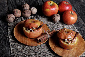 Baked apple with sugar and nuts