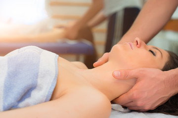 Fototapeta na wymiar Therapist massaging the neck of woman