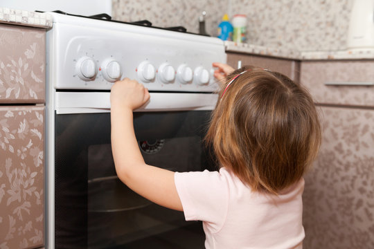  Child  Trying To Turn On Stove