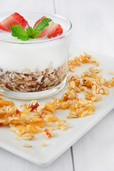 Yogurt with cereals and strawberries