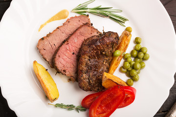 Grilled beef on a cutting board