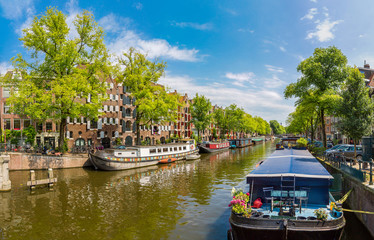 Fototapeta na wymiar Canal and bridge in Amsterdam
