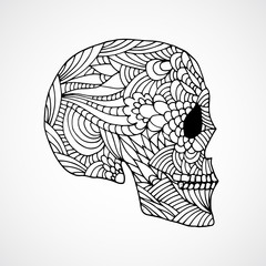 Hand drawn doodle swirled skull profile