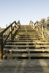 wooden stairs on the dunes to access the beach.Guardamar del Seg