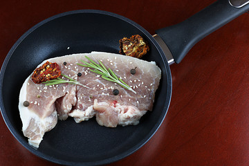 steak in a frying pan