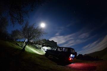 Night landscape on field and terrain car © bereta