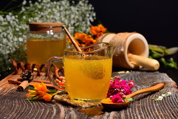 golden honey and colorful flowers