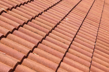 brown tile roof weathered on building residential