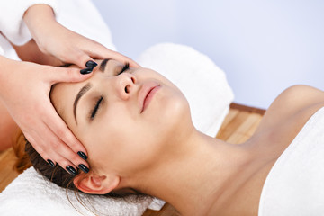 Fototapeta na wymiar Woman having massage of body in the spa salon. Beauty treatment