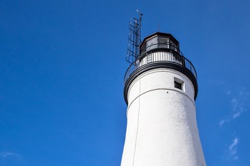 Fort Gratiot Lighthouse Tower. The Fort Gratiot Light is the oldest lighthouse in Michigan. Shot in horizontal orientation with copy space.