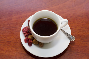 Espresso. White cup of coffee with snack