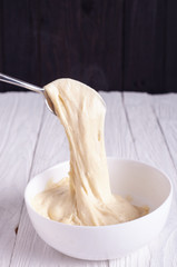 Cheese sauce in white plate 