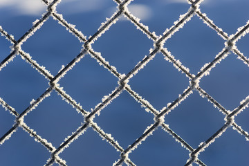 Fototapeta premium Chain link fence with snow