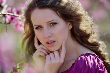 young woman portrait outdoor in spring