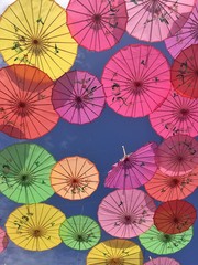 Fototapeta na wymiar Festival decoration with colorful umbrellas 