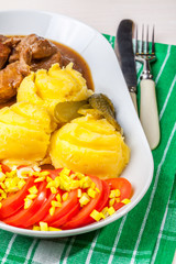 Roast turkey in gravy.