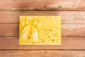 Gold gift box with knot
