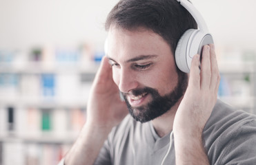 Young man listening to music