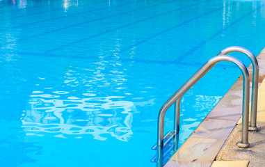 Obraz premium Stairs beside the swimming pool