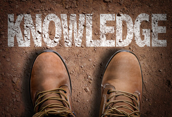 Top View of Boot on the trail with the text: Knowledge