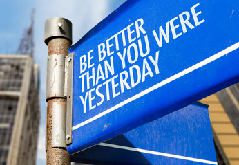 Be Better Than You Were Yesterday written on road sign