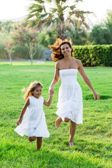 Obraz premium Mother and daughter are resting in the country side.