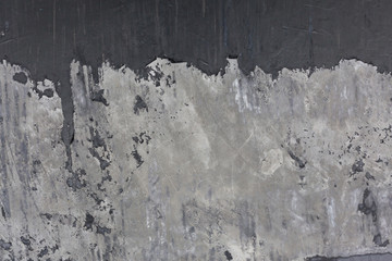 cement mortar wall texture with black paint grunge background