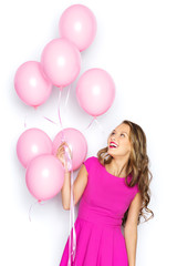 Fototapeta na wymiar happy young woman or teen girl in pink dress