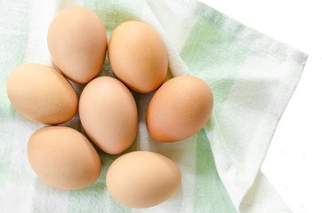 Fresh eggs in fabric.