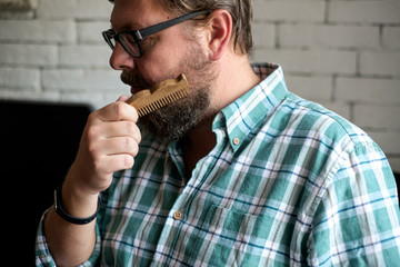 young man comb his hair