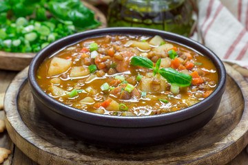 Homemade soup with lentils and sausages