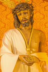 CORDOBA, SPAIN - MAY 27, 2015: The typically statue of vestet (Jesus Christ Nuestro Padre de la Humildad) by Antonio Bernal (1997) in church Convento de Capuchinos (Iglesia Santo Angel).