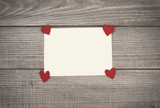 Valentine's card on wooden table