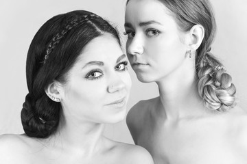 Fototapeta premium Portrait of two young women