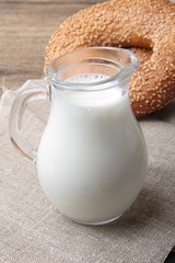 bagel with sesame seeds and milk