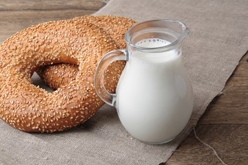 bagel with sesame seeds and milk