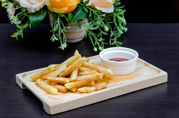 french fries on wooden plate