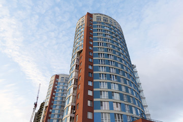 Fototapeta na wymiar Modern high-rise apartment building