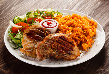 Grilled steaks and vegetables