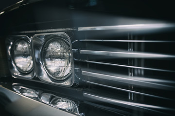 Obraz na płótnie Canvas Detail on the headlight of a vintage car.